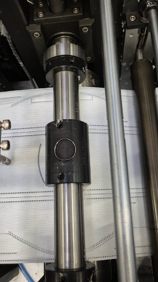 Breathing valve punching mechanism