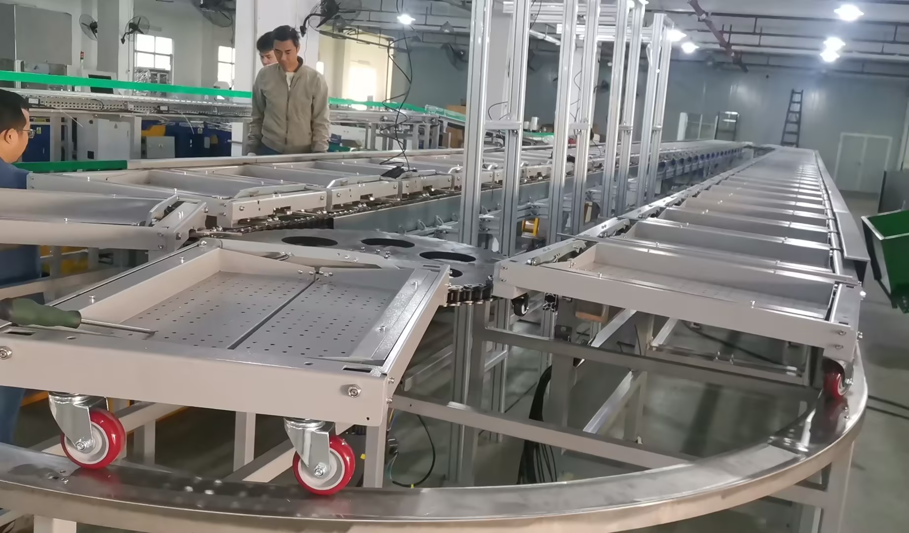High-Speed Garment Drop Tray Sorting System Solution by Gosunm