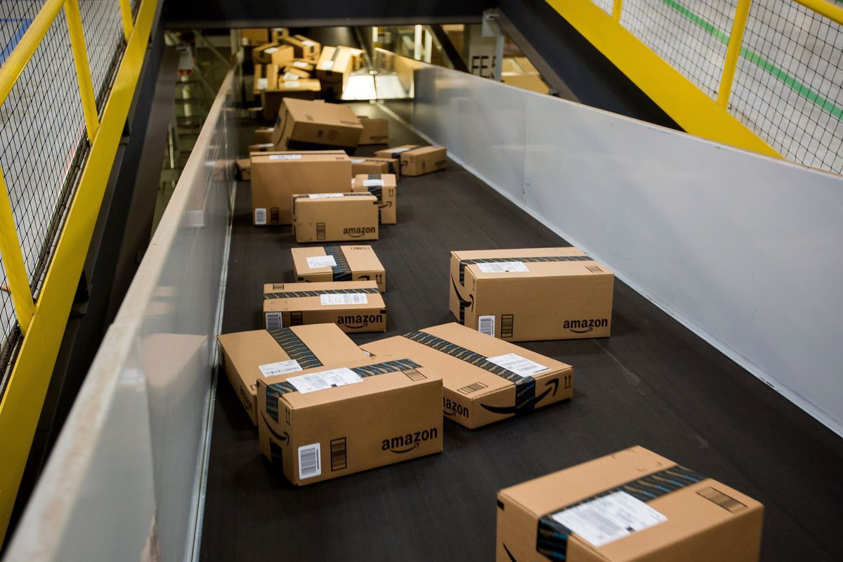 We process 200,000 e-commerce orders daily; which automated warehousing solution is best?