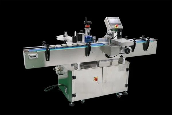 Vertical positioning round bottle labeling machine and sleeve labeling machine shipped to Algeria
