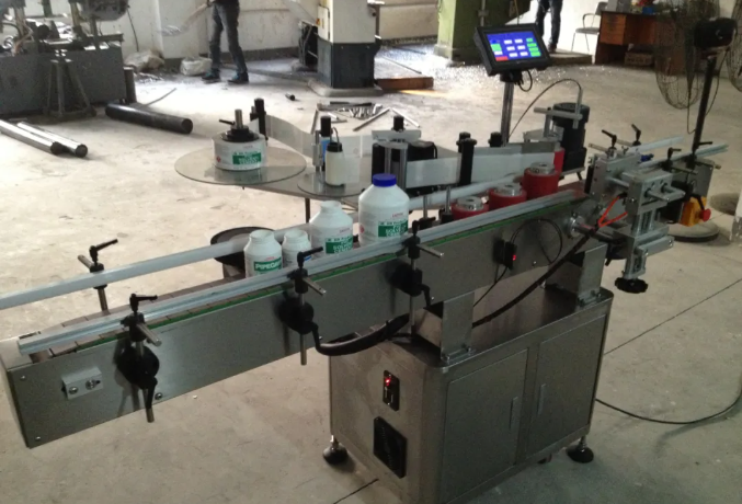 Round bottle labeling machine Round bottle labeling machine