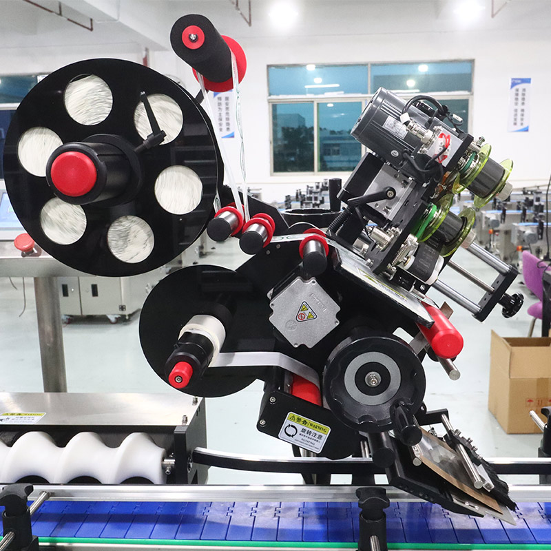 Shrink Sleeve Labeling Machine for Coils of Tin Wire