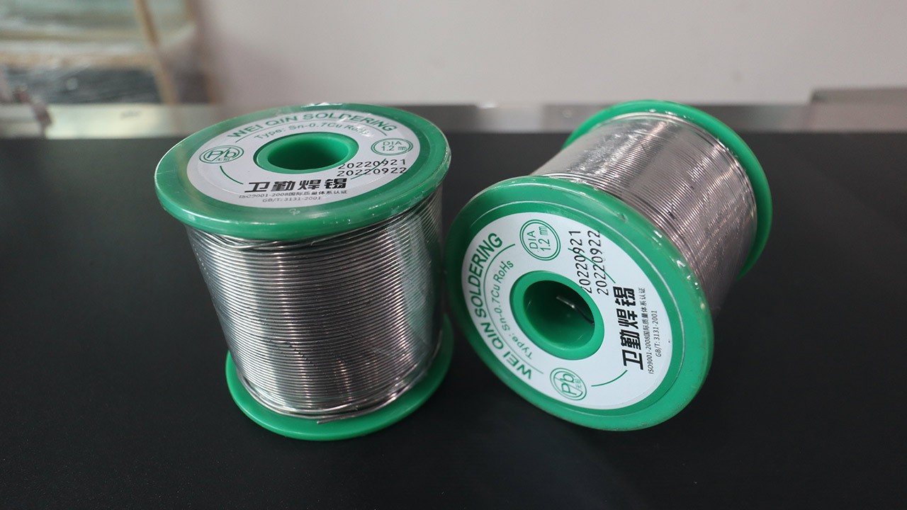 Shrink Sleeve Labeling Machine for Coils of Tin Wire Shrink Sleeve Labeling Machine for Coils of Tin Wire